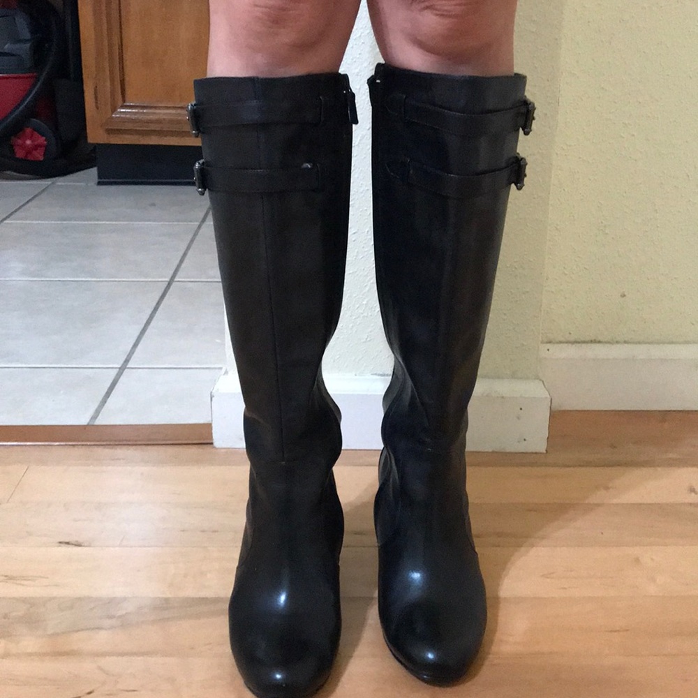 Black buckled boots